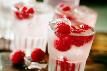 Red refreshing cocktail with raspberry and mint