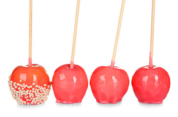 Delicious candy apples on white background