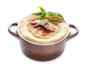 Baking dish with delicious pie on white background