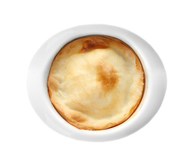 Baking cup with delicious turkey pie on white background