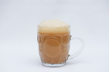 Tea With Milk Or Popularly Known As Teh Tarik Over White Background