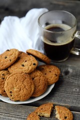 Homemade oatmeal cookies with raisins and coffee 