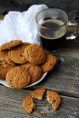 Homemade oatmeal cookies with raisins and coffee 