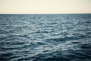 Fototapeta premium sea water smooth surface, ocean reflection