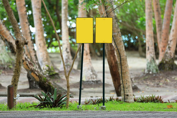 Blank board in park at tropical resort