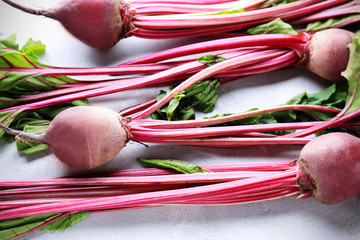 Fresh young beets on light background