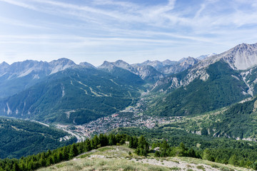 Fototapeta premium Panoramic view of Bardonecchia and village from above, Italy