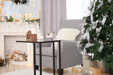 Decorated Christmas room with beautiful fir tree