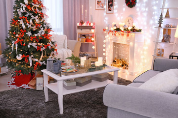 Decorated living room with beautiful Christmas tree