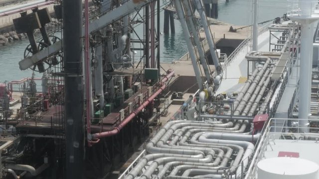LPG terminal and pipes with gas on tanker