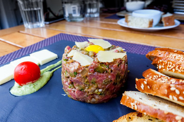 tasty Steak tartare (Raw beef) - classic steak tartare on white plate