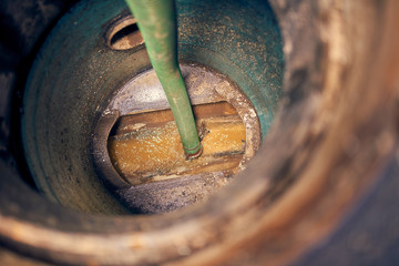 Emptying septic tank, cleaning the sewers
Septic cleaning and sewage removal. Emptying household septic tank. Cleaning sludge from septic system. - obrazy, fototapety, plakaty