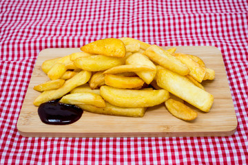 Golden French fries potatoes ready to be eaten