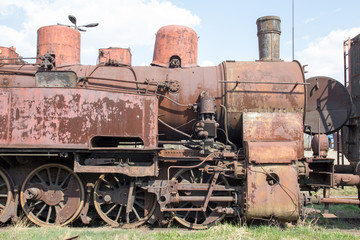 Old rusty locomotives at the derelict station