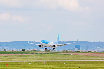 Fototapeta premium Airplane on landing approach, airport