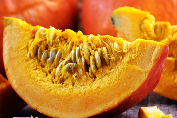 Pumpkin and pumpkin slices Autumn Healthy Food Nutrition Seasonal Vegetable Concept