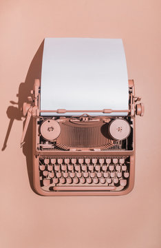 Pink Typewriter On Pink Background