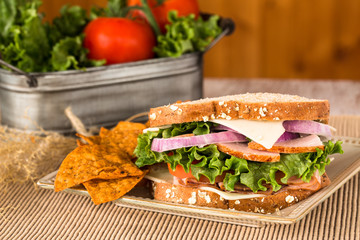 Delicious Ham Turkey Sandwich With Chips