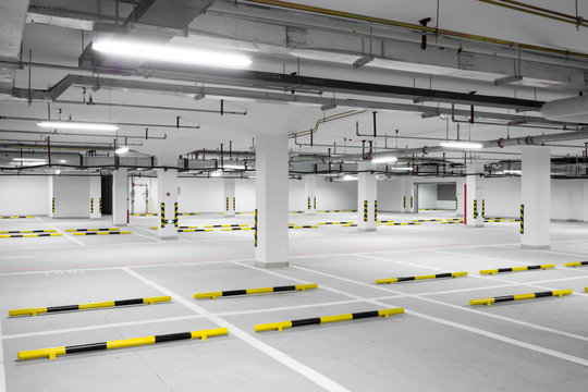 Interior Of Illuminated Underground Parking Lot