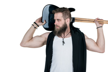 A charismatic man with a beard is holding an electric guitar, on a white isolated background. Horizontal frame