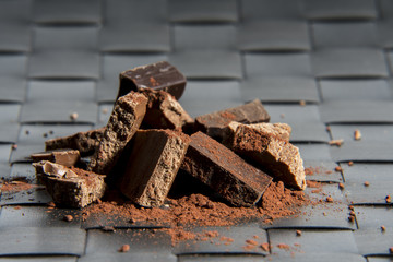 Pile of chocolate on squared designed surface