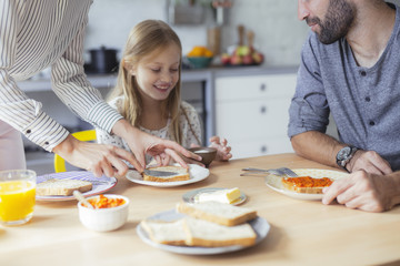 Family Having Breakfast Together