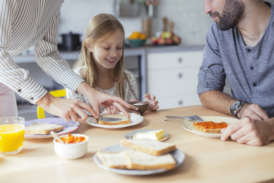 Family Having Breakfast Together