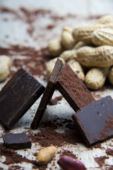 Chocolate structure with peanuts and nutshells