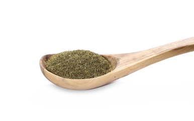 Pile of dry dill in wooden spoon isolated on white background 