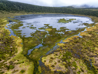 Aerial view of the Caldeira Branca lake on the island of Flores in the Azores.