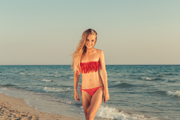 Portrait of a beautiful girl at the sea