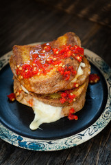 Grill cheese sandwich with red chili pepper