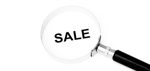 Sale symbol with magnifier