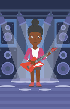 An african-american woman playing electric guitar on the stage with spotlights vector flat design illustration. Vertical layout.