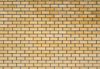 Texture of the yellow brickwork.