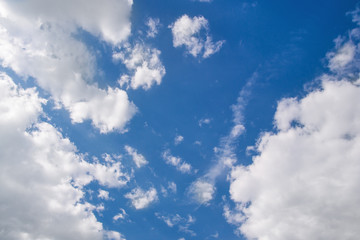 Clear blue sky with white clouds