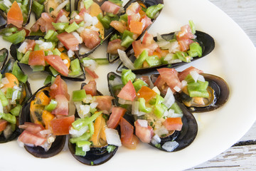 Vinaigrette mussels served on a plate