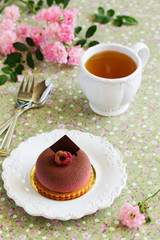 Chocolate raspberry cake with tonka beans in chocolate velor.
