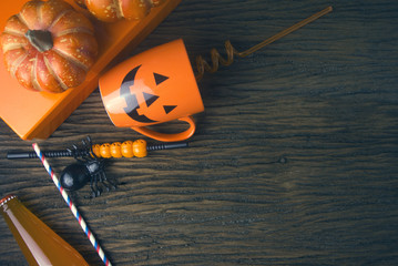 halloween pumpkin party decor and drink on wood table