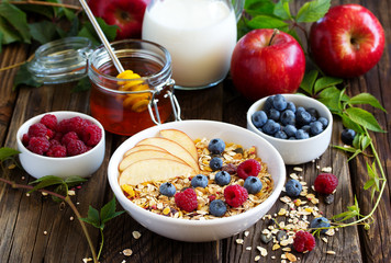 Granola, apples, raspberries,