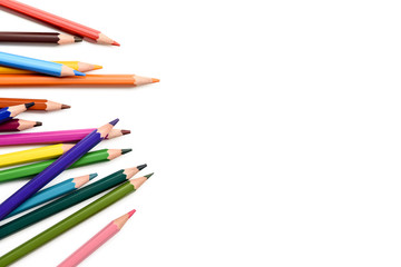 Colored pencils isolated on white background