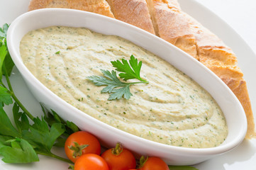 roasted aubergine dip with yogurt, onion, garlic, lemon juice, olive oil, and olive oil  added 