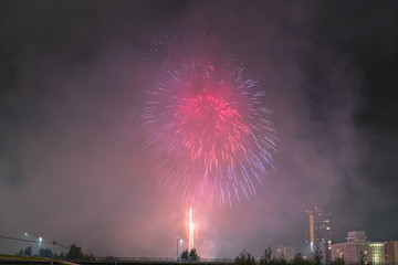 Obraz na płótnie Canvas Toyohira River Fireworks, this festival is regarded as Hokkaido most popular fireworks festival over 4000 fireworks light up the night sky over Sapporo, Japan. Image show noise due night shot.
