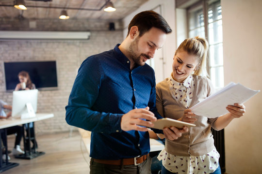 Picture of young designers using tablet in office