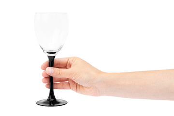 female hand holding empty wine glass. Isolated on white background