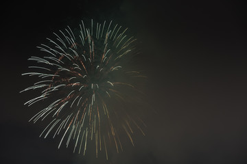 Obraz premium Toyohira River Fireworks, this festival is regarded as Hokkaido most popular fireworks festival over 4000 fireworks light up the night sky over Sapporo, Japan. Image show noise due night shot.