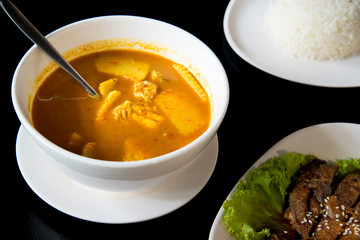  Kaeng Som (a sour, spicy type of soup).