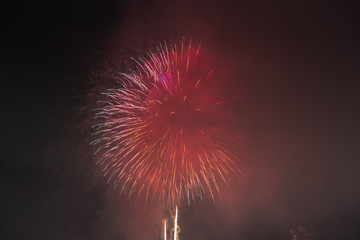Toyohira River Fireworks, this festival is regarded as Hokkaido most popular fireworks festival over 4000 fireworks light up the night sky over Sapporo, Japan. Image show noise due night shot.