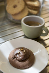 pastry with melted chocolate and espresso coffee
