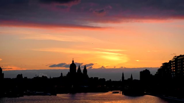 Amsterdam sunset with Church of Saint Nicholas view
